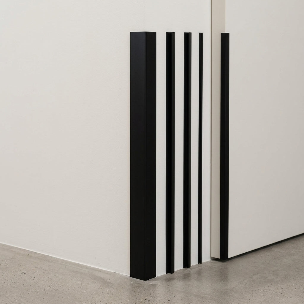 Black PVC corner angle trim – different sizes fitted on a wall corner