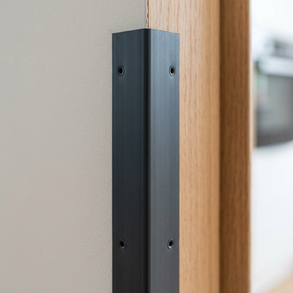 Anthracite PVC corner angle trim – fitted on a cabinet corner