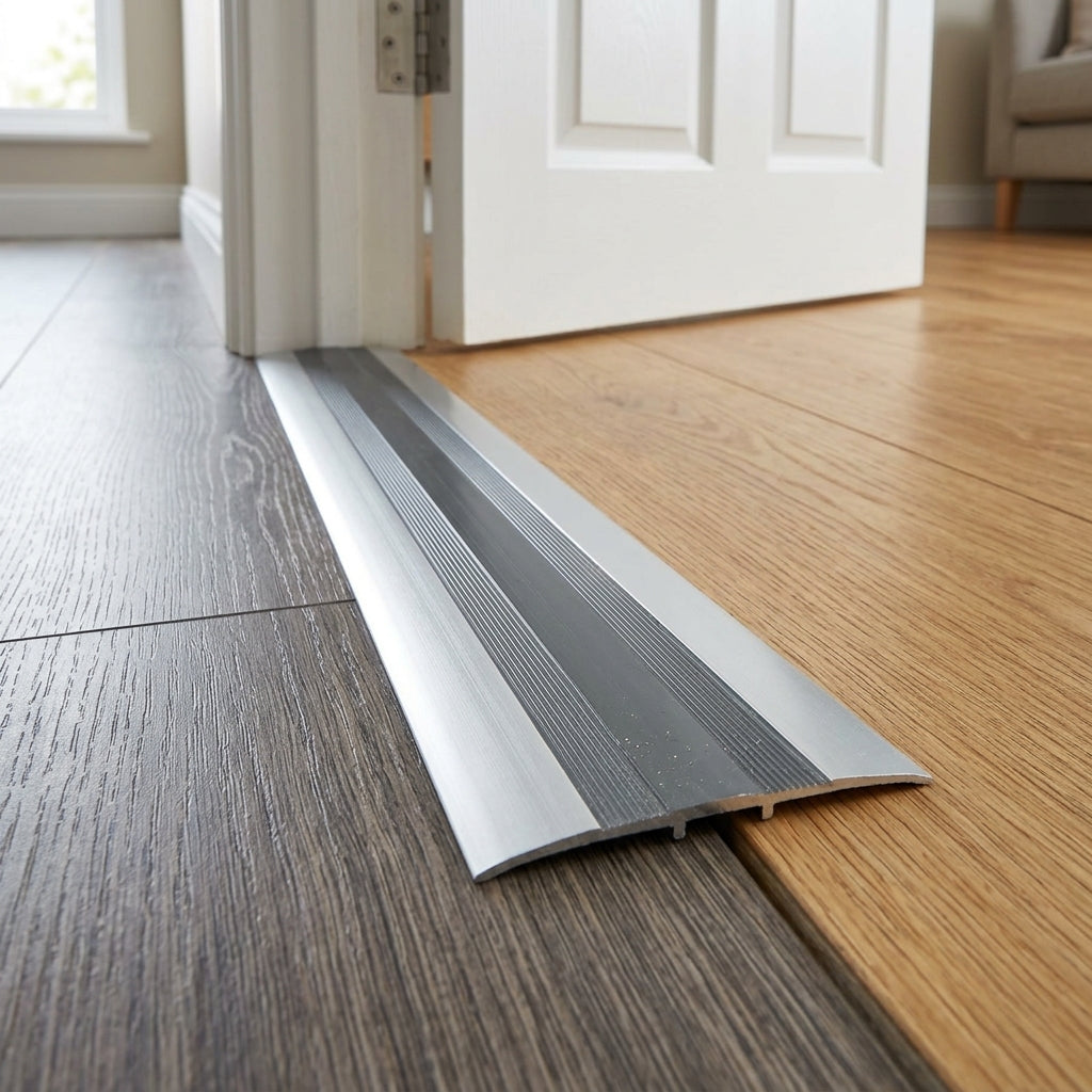 Self-adhesive aluminium door threshold strip, 35 mm x 930 mm – fitted between two wooden floors in a doorway