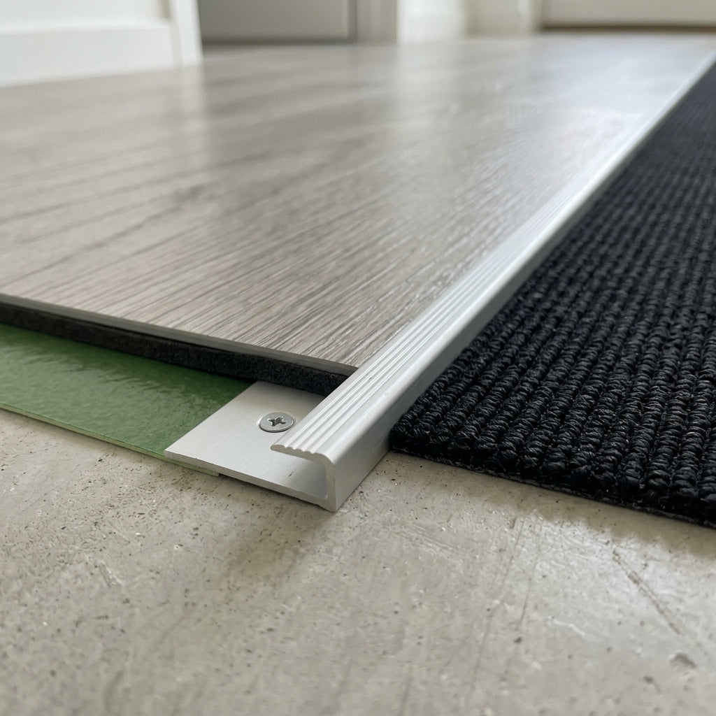 Anodised aluminium flooring edge profile for 5 mm LVT – fitted between LVT flooring and carpet